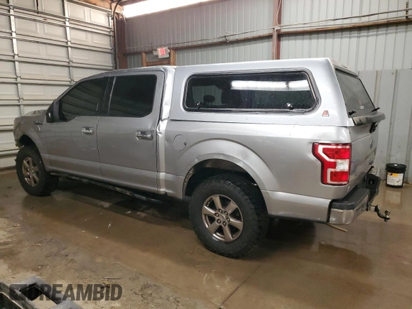 2020 Ford F-150 XL with VIN 1FTEW1E57LKF44499, listed as a Copart auction lot 60336735 with 156,745 mi miles and Salvage title. Bid and sale history available at DreamBid. Image 2.