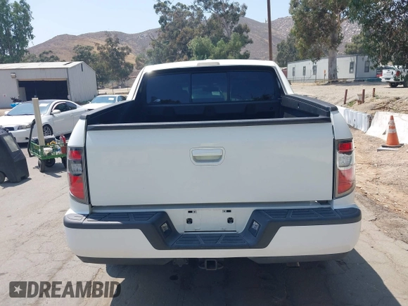 2012 Honda Ridgeline RTL z VIN 5FPYK1F57CB455267, wystawiony jako IAAI lot #42462296 z przebiegiem 186 451 mil mil oraz . Historia ofert i sprzedaży dostępna na DreamBid. Obrazek 16.