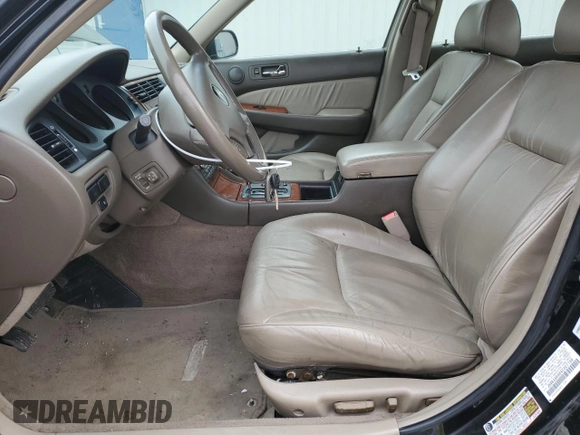 2004 Acura RL w/Navigation System z VIN JH4KA96664C007799, wystawiony jako Copart lot #44207245 z przebiegiem 215 098 mil mil oraz Szkoda całkowita • Salvage title. Historia ofert i sprzedaży dostępna na DreamBid. Obrazek 7.