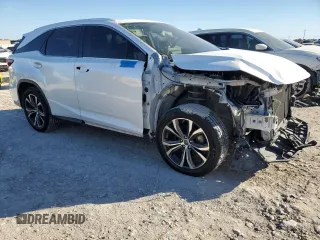 2020 Lexus RX 350L with VIN JTJHZKEA7L2017339, listed as a Copart auction lot 80693844 with 56,172 mi miles and Salvage title. Bid and sale history available at DreamBid. Image 4.