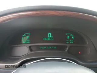 2005 Cadillac DTS Professional 1SH z VIN 1GEEH00Y25U500110, wystawiony jako Copart lot #44222285 z przebiegiem 82 553 mil mil oraz Tytuł czysty. Historia ofert i sprzedaży dostępna na DreamBid. Obrazek 9.