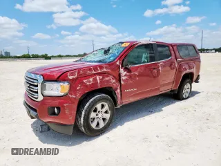 2018 GMC Canyon 2WD SLE with VIN 1GTG5CEN7J1311541, listed as a Copart auction lot 60136205 with 117,027 mi miles and Salvage title. Bid and sale history available at DreamBid. Image 1.
