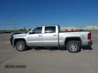 2017 GMC Sierra 1500 SLE with VIN 3GTU2MEC0HG202074, listed as a IAAI auction lot 42067320 with 184,424 mi miles and . Bid and sale history available at DreamBid. Image 14.