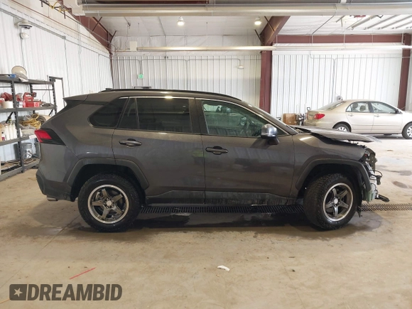 2019 Toyota RAV4 XLE with VIN 2T3P1RFV8KW057323, listed as a IAAI auction lot 42510231 with 59,003 mi miles and . Bid and sale history available at DreamBid. Image 14.