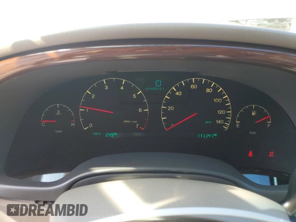2002 Cadillac DeVille DHS z VIN 1G6KE57Y32U107755, wystawiony jako Copart lot #52811235 z przebiegiem 111 141 mil mil oraz Nie do naprawy. Historia ofert i sprzedaży dostępna na DreamBid. Obrazek 9.