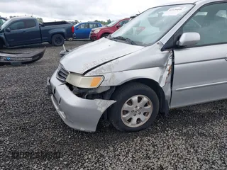 2003 Honda Odyssey EX-L z VIN 5FNRL18033B042810, wystawiony jako IAAI lot #42229495 z przebiegiem 231 682 mil mil oraz . Historia ofert i sprzedaży dostępna na DreamBid. Obrazek 6.