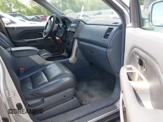 2008 Honda Pilot EX-L with VIN 5FNYF28558B016026, listed as a IAAI auction lot 42192781 with 271,829 mi miles and . Bid and sale history available at DreamBid. Image 5.