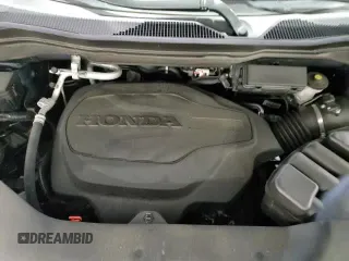 2021 Honda Pilot Touring 7-Passenger z VIN 5FNYF6H65MB029949, wystawiony jako Copart lot #65799375 z przebiegiem 58 183 mil mil oraz Szkoda całkowita • Salvage title. Historia ofert i sprzedaży dostępna na DreamBid. Obrazek 17.