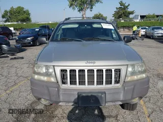 2004 Jeep Grand Cherokee Laredo with VIN 1J4GX48N24C334983, listed as a IAAI auction lot 42522088 with 169,793 mi miles and . Bid and sale history available at DreamBid. Image 12.