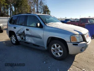 2007 GMC Envoy SLE with VIN 1GKDT13SX72142175, listed as a Copart auction lot 45945305 with 169,048 mi miles and Salvage Title. Bid and sale history available at carsss.com. Image 4.