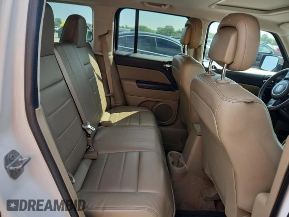 2015 Jeep Patriot High Altitude with VIN 1C4NJRFB5FD114125, listed as a Copart auction lot 62475615 with 104,438 mi miles and Salvage title. Bid and sale history available at DreamBid. Image 11.