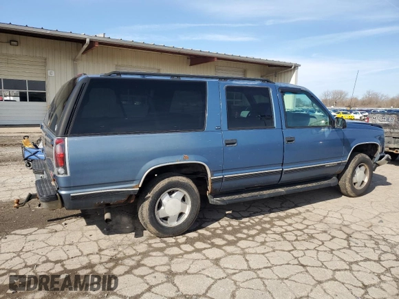 1997 GMC Suburban with VIN 1GKFK16R7VJ707618, listed as a Copart auction lot 49882035 with 317,771 mi miles and Salvage Title. Bid and sale history available at carsss.com. Image 3.