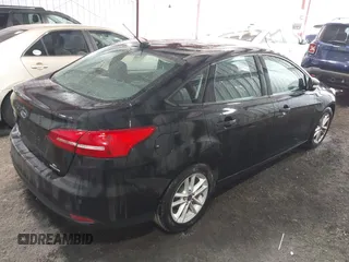 2015 Ford Focus SE with VIN 1FADP3F25FL216205, listed as a IAAI auction lot 42425478 with 124,117 mi miles and . Bid and sale history available at DreamBid. Image 4.
