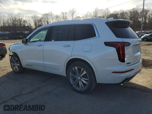 2022 Cadillac XT6 Premium Luxury z VIN 1GYKPDRS9NZ113152, wystawiony jako Copart lot #49411355 z przebiegiem 32 948 mil mil oraz Szkoda całkowita • Salvage title. Historia ofert i sprzedaży dostępna na DreamBid. Obrazek 2.