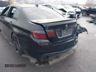 2015 BMW 5 Series 535i with VIN WBA5B1C51FG125924, listed as a IAAI auction lot 41060431 with 102,957 mi miles and . Bid and sale history available at carsss.com. Image 6.
