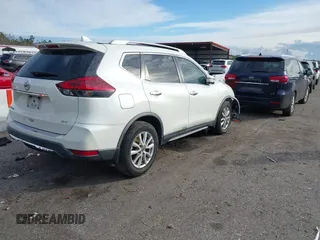2018 Nissan Rogue S with VIN KNMAT2MT5JP594833, listed as a IAAI auction lot 38383239 with 133,466 mi miles and . Bid and sale history available at carsss.com. Image 4.
