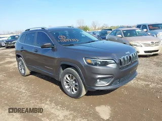 2019 Jeep Cherokee Latitude Plus with VIN 1C4PJMLBXKD162570, listed as a IAAI auction lot 41897313 with 142,110 mi miles. Bid and sale history available at carsss.com. Image 1.