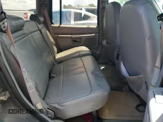 1996 Ford Explorer XLT z VIN 1FMDU32P0TZA75326, wystawiony jako Copart lot #43005845 z przebiegiem 67 286 mil mil oraz Szkody całkowita. Historia ofert i sprzedaży dostępna na DreamBid. Obrazek 11.