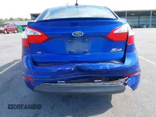 2014 Ford Fiesta SE with VIN 3FADP4BJ5EM190009, listed as a IAAI auction lot 42036976 with 157,575 mi miles. Bid and sale history available at carsss.com. Image 13.