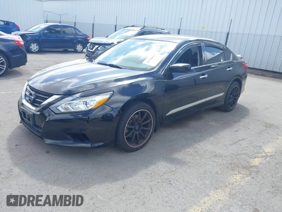 2016 Nissan Altima SR with VIN 1N4AL3AP2GC142213, listed as a IAAI auction lot 41946863 with 100,858 mi miles and . Bid and sale history available at carsss.com. Image 2.