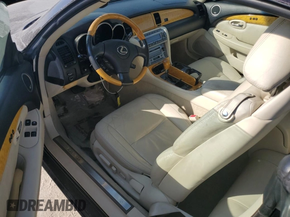 2002 Lexus SC 430 with VIN JTHFN48Y520034983, listed as a Copart auction lot 74084354 with 88,979 mi miles and Salvage Title. Bid and sale history available at DreamBid. Image 8.