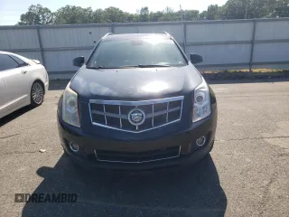 2011 Cadillac SRX Premium Collection with VIN 3GYFNFEYXBS547540, listed as a Copart auction lot 62563895 with 107,136 mi miles and Salvage title. Bid and sale history available at DreamBid. Image 5.