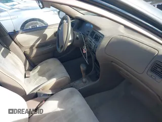 1997 Toyota Corolla with VIN 1NXBA02E5VZ595972, listed as a IAAI auction lot 41622050 with 143,577 mi miles and . Bid and sale history available at DreamBid. Image 5.