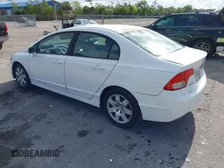 2010 Honda Civic LX with VIN 2HGFA1F54AH533810, listed as a IAAI auction lot 42171253 with 211,551 mi miles and . Bid and sale history available at DreamBid. Image 3.