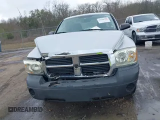 2005 Dodge Dakota ST with VIN 1D7HE22K25S119460, listed as a IAAI auction lot 41790592 with 104,995 mi miles and . Bid and sale history available at DreamBid. Image 12.