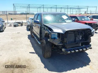 2023 Toyota Tacoma SR with VIN 3TYCZ5ANXPT167858, listed as a IAAI auction lot 42310501 with 12,811 mi miles and . Bid and sale history available at DreamBid. Image 1.