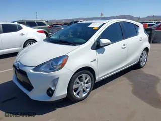 2015 Toyota Prius c One with VIN JTDKDTB37F1089798, listed as a IAAI auction lot 41838827 with 137,655 mi miles. Bid and sale history available at carsss.com. Image 2.