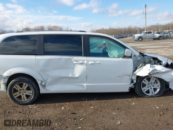 2019 Dodge Grand Caravan SXT with VIN 2C4RDGCG4KR771745, listed as a IAAI auction lot 41859267 with 97,436 mi miles and . Bid and sale history available at DreamBid. Image 13.