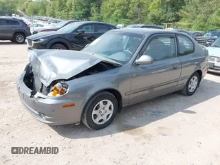 2003 Hyundai Accent GL z VIN KMHCG35CX3U243322, wystawiony jako IAAI lot #42277841 z przebiegiem 45 855 mil mil oraz . Historia ofert i sprzedaży dostępna na DreamBid. Obrazek 2.