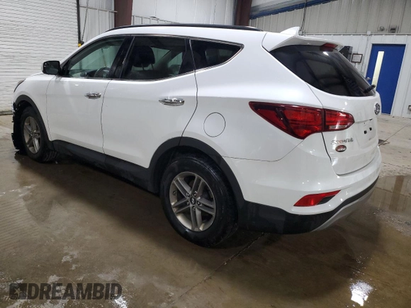 2017 Hyundai Santa Fe 2.4L with VIN 5NMZUDLB2HH005387, listed as a Copart auction lot 64592535 with 82,742 mi miles and Salvage title. Bid and sale history available at DreamBid. Image 2.
