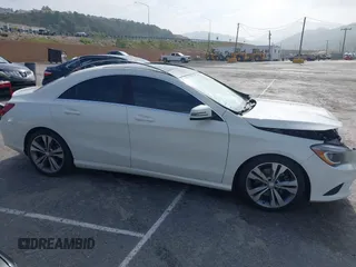 2014 Mercedes-Benz CLA 250 z VIN WDDSJ4EB0EN044118, wystawiony jako IAAI lot #42141130 z przebiegiem 76 122 mil mil oraz . Historia ofert i sprzedaży dostępna na DreamBid. Obrazek 13.