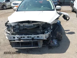 2016 Ford Focus Titanium with VIN 1FADP3N28GL222941, listed as a IAAI auction lot 42050881 with 97,001 mi miles and . Bid and sale history available at DreamBid. Image 6.