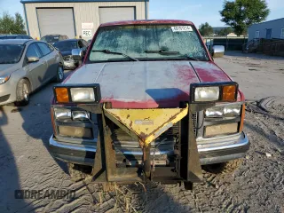 1989 GMC Sierra 2500 z VIN 1GTGK24K9KE531445, wystawiony jako Copart lot #69101214 z przebiegiem Nie podano mil oraz Szkody całkowita. Historia ofert i sprzedaży dostępna na DreamBid. Obrazek 5.