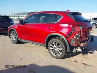 2020 Mazda CX-5 Grand Touring with VIN JM3KFADM7L0729537, listed as a IAAI auction lot 41864569 with 82,998 mi miles. Bid and sale history available at carsss.com. Image 3.