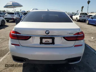 2019 BMW 7 Series 750i with VIN WBA7F0C5XKGM25771, listed as a Copart auction lot 47239195 with 73,691 mi miles and Salvage Title. Bid and sale history available at carsss.com. Image 6.