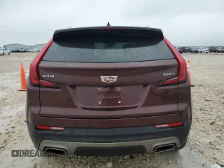 2023 Cadillac XT4 FWD Premium Luxury with VIN 1GYFZCR48PF100078, listed as a Copart auction lot 55955865 with 23,509 mi miles and Salvage title. Bid and sale history available at DreamBid. Image 6.