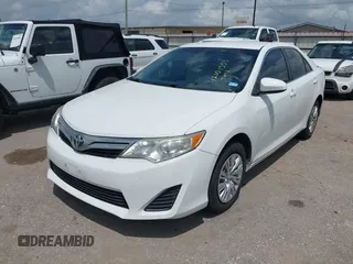 2014 Toyota Camry L with VIN 4T4BF1FK2ER375590, listed as a IAAI auction lot 42101553 with 126,849 mi miles and . Bid and sale history available at DreamBid. Image 2.