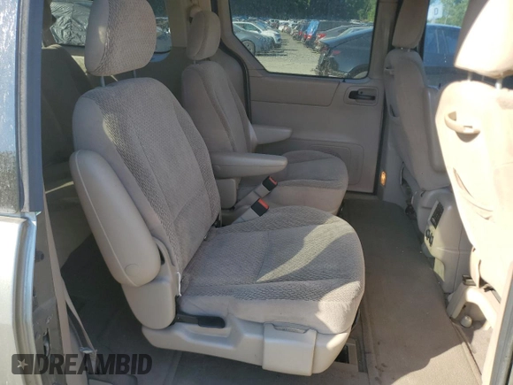 2003 Ford Windstar SE z VIN 2FMZA52433BB25493, wystawiony jako Copart lot #69988344 z przebiegiem Nie podano mil oraz Czysty tytuł • Clean title. Historia ofert i sprzedaży dostępna na DreamBid. Obrazek 11.