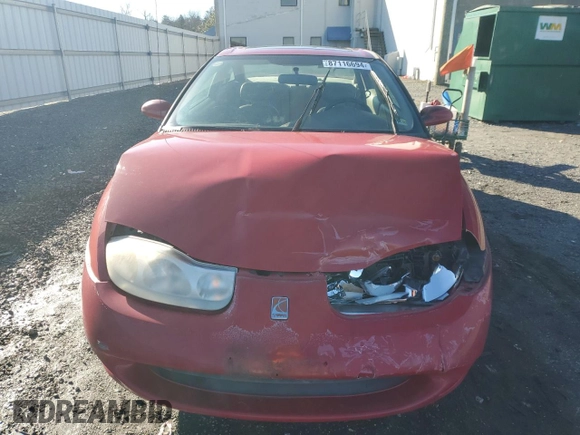 2001 Saturn SC z VIN 1G8ZY12751Z284992, wystawiony jako Copart lot #87116694 z przebiegiem 134 690 mil mil oraz Tytuł czysty. Historia ofert i sprzedaży dostępna na DreamBid. Obrazek 5.