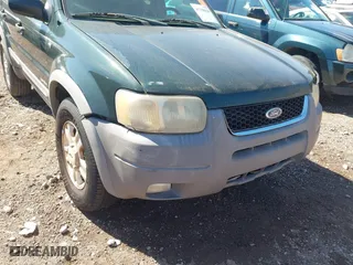 2001 Ford Escape XLT with VIN 1FMCU03121KF56950, listed as a IAAI auction lot 41768628 with 265,069 mi miles. Bid and sale history available at carsss.com. Image 6.