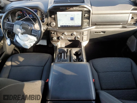 2021 Ford F-150 XL with VIN 1FTFW1E55MFA77310, listed as a Copart auction lot 56179055 with 48,990 mi miles and Salvage title. Bid and sale history available at DreamBid. Image 8.