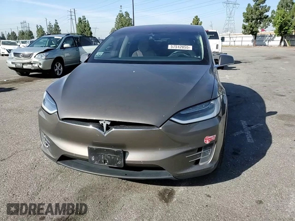 2016 Tesla Model X 70D z VIN 5YJXCBE23GF010836, wystawiony jako Copart lot #57512055 z przebiegiem 115 475 mil mil oraz Szkody całkowita. Historia ofert i sprzedaży dostępna na DreamBid. Obrazek 14.