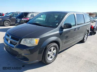 2012 Dodge Grand Caravan SXT with VIN 2C4RDGCG7CR196882, listed as a IAAI auction lot 41981520 with 100,746 mi miles. Bid and sale history available at carsss.com. Image 2.
