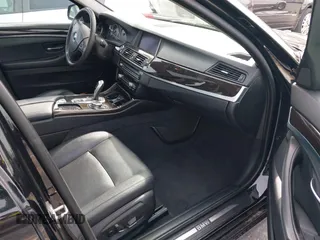 2014 BMW 5 Series 535i with VIN WBA5B1C54ED476763, listed as a IAAI auction lot 41590236 with 115,048 mi miles and . Bid and sale history available at DreamBid. Image 5.