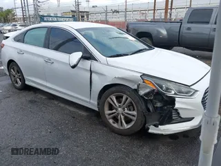 2018 Hyundai Sonata Sport with VIN 5NPE34AF8JH651873, listed as a IAAI auction lot 41777464 with 97,342 mi miles and . Bid and sale history available at carsss.com. Image 1.