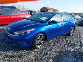 2022 Kia Forte LXS z VIN 3KPF24AD1NE500860, wystawiony jako IAAI lot #42052343 z przebiegiem 57 302 mil mil oraz . Historia ofert i sprzedaży dostępna na DreamBid. Obrazek 2.